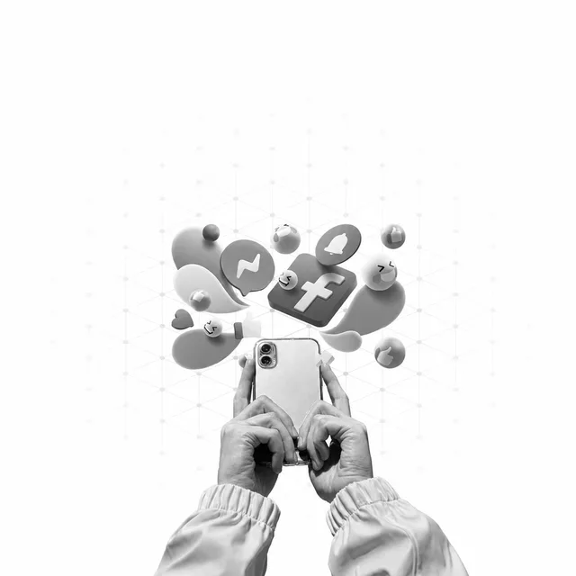 Hands holding a phone surrounded by floating social media icons